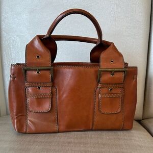 Aldo Brown Authentic Leather womansBag 12”x7 with Buckle Detail. Cognac brown